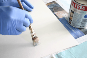 Sealing the surface of the mount board with varnish
