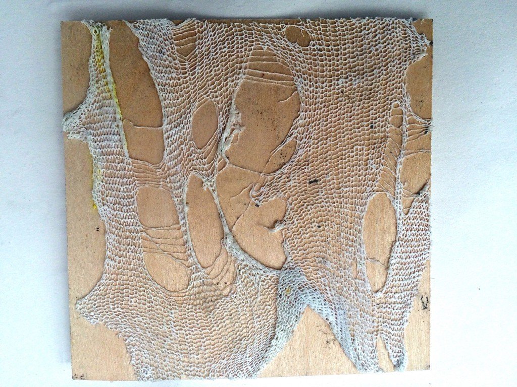 Six by Six by Eleven: birch plywood printing plate with torn dishcloth